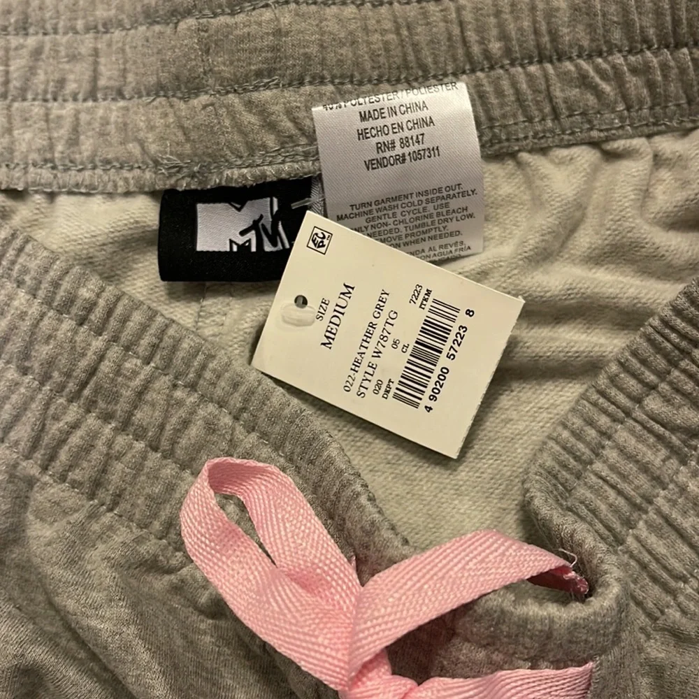 MTV pj cut off shorts 80% cotton gray‎ with a pink bow size medium NWT